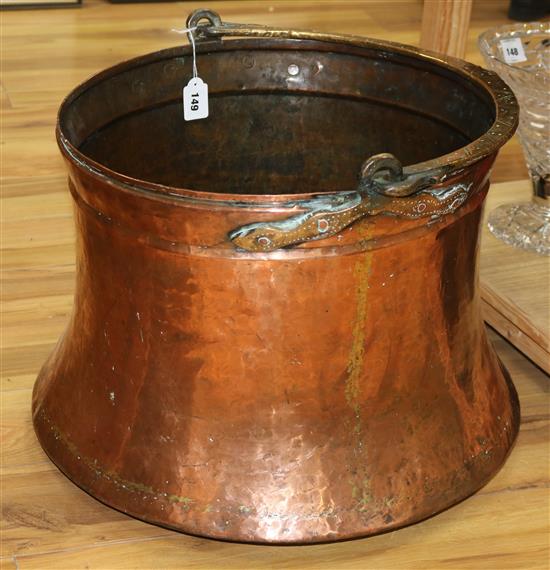 An Islamic copper cooking pot